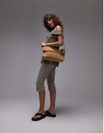folded suede clutch grab bag with attachable shoulder strap in light neutral brown