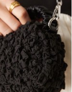 ruched handle textured grab bag with detachable chain crossbody strap in black