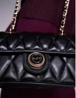 loubella crossbody bag with chain strap in black and gold