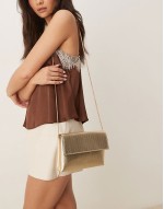 metallic foldover clutch in gold