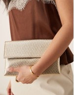 metallic foldover clutch in gold