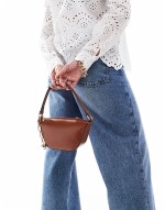 clean scoop shoulder bag with detachable ball charm in tan