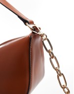 clean scoop shoulder bag with detachable ball charm in tan