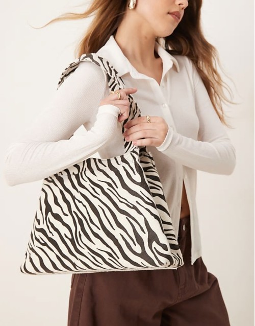 tapered shoulder bag in zebra print
