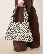 tapered shoulder bag in zebra print